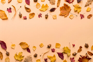 Autumn composition. Pattern made of dried leaves and other design accessories on table. Flat lay,...