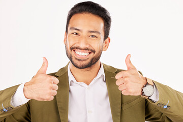Thumbs up, portrait and asian man in business for success in studio, white background and winning...