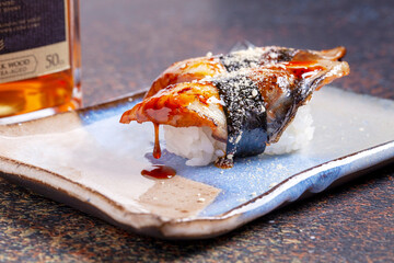 Sushi, delicious Japanese cuisine. Rolls of delicious sushi on a plate