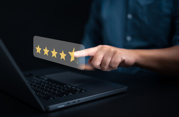 Customer feedback satisfaction survey concept. Customers use laptop and point happy smiley icon. Satisfied, 5 Stars, Service experience rating. Online complacency Review application, Checking quality.