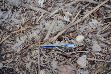 Plastic garbage toiletries. Toothbrush waste.
