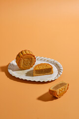 Moon Cake Mid Autumn Festival with orange background ,chinese style photograph