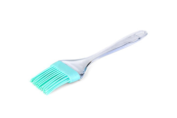 Green silicone cooking brush on a white background.