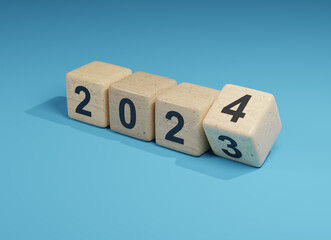 Flipping wooden cubes with the Year number 2023 and 2024, New Year concept