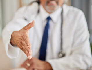 Handshake, meeting and doctor or man for welcome, introduction and thank you in healthcare service. Medical professional person shaking hands in patient POV consultation, advice or support in office