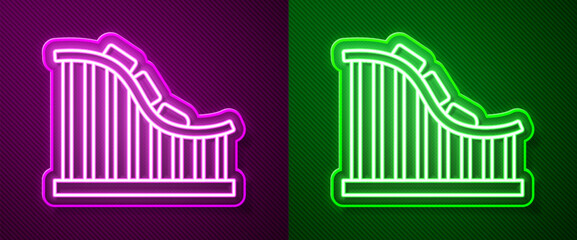 Glowing neon line Roller coaster icon isolated on purple and green background. Amusement park. Childrens entertainment playground, recreation park. Vector