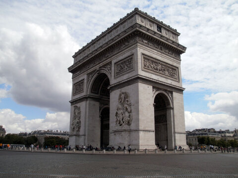 Paris, France - August 10th 2013 : Focus on the famous french Arc de triomphe. It was in the past an entrance on the Champs Elysees. In this picture, there is no car which is pretty rare in Paris.