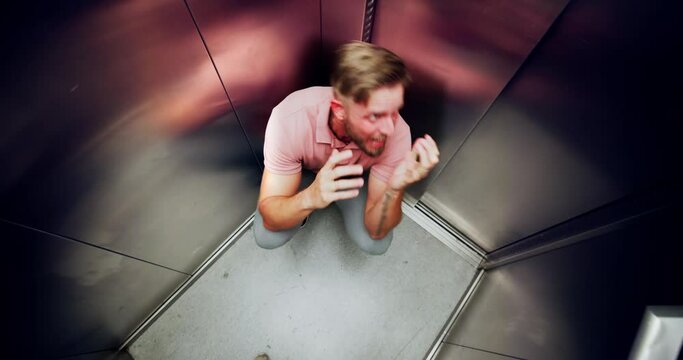 Man Suffering From Claustrophobia Trapped Inside Elevator