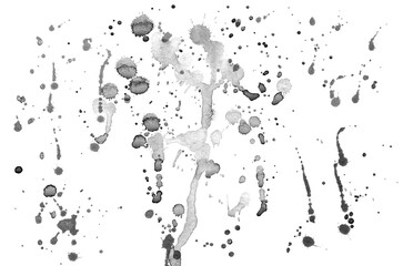 Black ink dripping on paper isolated on a white