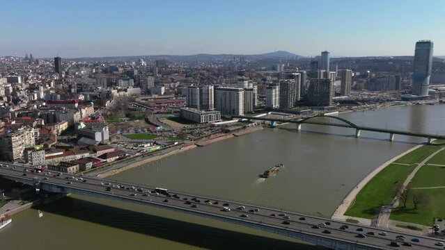 Aerial shot of busy bridge in Belgrade. Branko bridge and Belgrade waterfront.