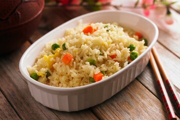 Satisfying Comfort: Close-Up of Chicken Fried Rice with Fresh Vegetables, Captured in 4K Resolution