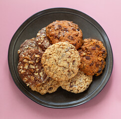 homemade cookies on plate  on pink background