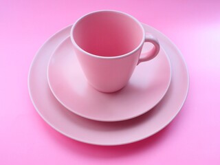 Pink cup and dishes closeup