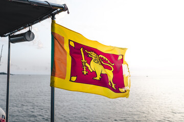 Flag Sri Lanka on boat with sunset