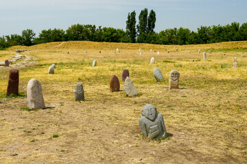 Antropomorphic stone kurgan balbal near Burana tower Kyrgystan. High quality photo