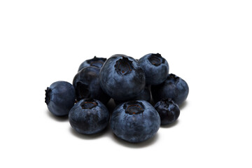 a bunch of blueberries on a white background