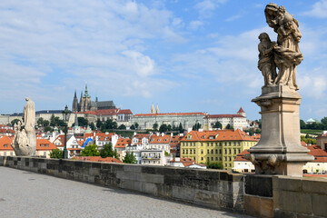 Fototapeta na wymiar People walking on Charles bridge at Prague on Czech republic