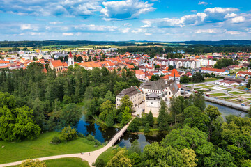 Blatna castle near Strakonice, Southern Bohemia, Czech Republic. Aerial view of medieval Blatna water castle surrounded parks and lakes, Blatna, South Bohemian Region, Czech Republic.