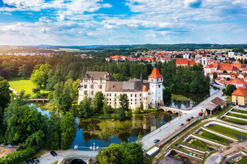 Blatna castle near Strakonice, Southern Bohemia, Czech Republic. Aerial view of medieval Blatna water castle surrounded parks and lakes, Blatna, South Bohemian Region, Czech Republic.