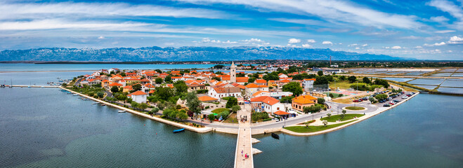 Historic town of Nin laguna aerial view with Velebit mountain background, Dalmatia region of Croatia. Aerial view of the famous Nin lagoon and medieval in Croatia - 627755033