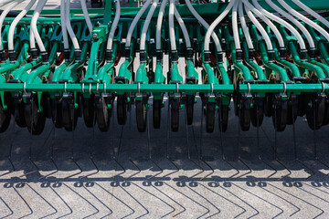 Agricultural machinery on a sunny day. Texture, background for design.