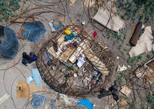 Aerial view of afar people building a hut, Afar Region, Afambo, Ethiopia