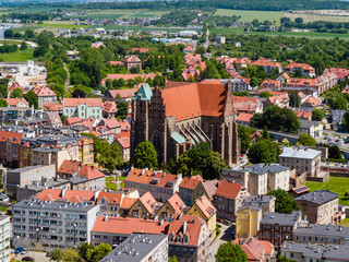 Saints Peter and Paul Church in Strzegom, historic brick Gothic minor basilica aerial landscape