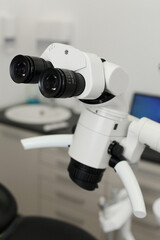 Dental Microscope in a dental office photographed on a white background