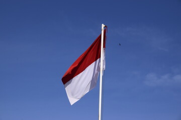Fototapeta na wymiar indonesian flag with blue sky