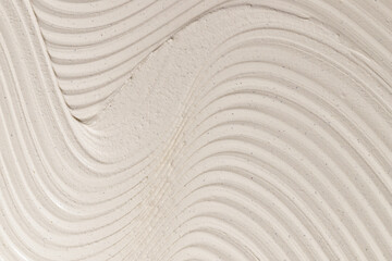Close-up texture of beige moisturizing cream. Skin care product background. Face mask