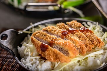 Savory Delights: Close-Up of Deep-Fried Orange Chicken Served on a Bed of Steamed White Rice, Captured in 4K Resolution