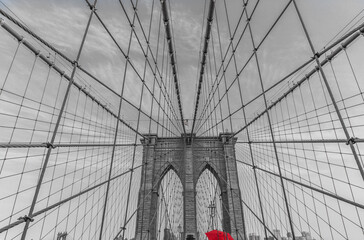  Black and White Brooklyn Bridge architectural details with a red umbrella.