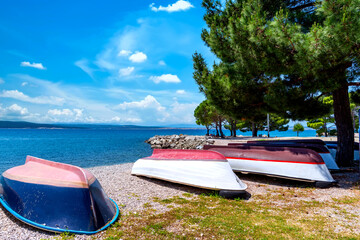 Scenic beach with boats in Crikvenica, Croatia