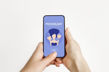 Bipolar disorder concept. Female hands hold a phone with a mobile application on psychology