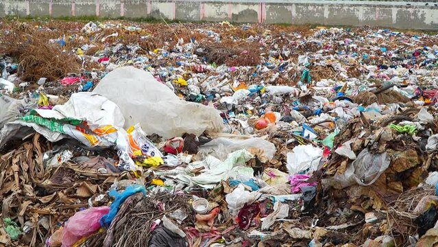 Polythene covers of household waste in dump yard
