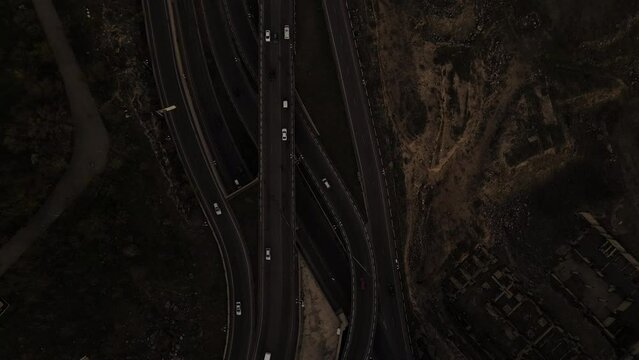 Aerial view of road traffic in the city of Yerevan in Armenia. Drone flight over the highway. Cinematic 4k footage.