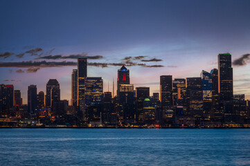 Colorful Seattle Sunrise Across Elliott Bay. Seen from West Seattle this modern city sparkles just...