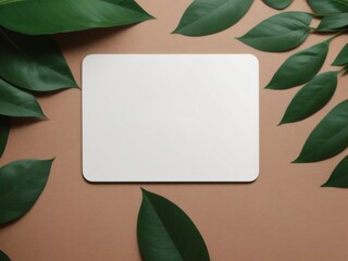 Fototapeta na wymiar A visual presentation of a white template mockup, complemented by green leaves for organic product presentation, set on a minimalist, trendy flat lay backdrop. Created with generative AI tools