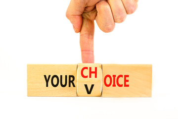 Your voice choice symbol. Businessman turns wooden cubes and changes the concept word Your choice...