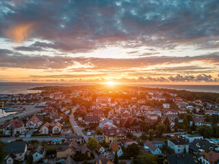 beautiful sunset at Jastarnia town, Poland, Hel peninsula, aerial drone view - obrazy, fototapety, plakaty