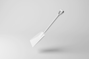 White shovel floating in mid air on white background in monochrome and minimalism. Illustration of the concept of gardening tool