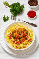 Creamy Paprika Pork Chunks over tagliatelle noodle