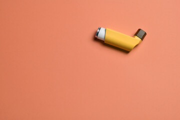 Inhaler for respiratory problems and diseases, zenith view and copy space.