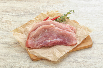 Raw pork schnitzel for roast