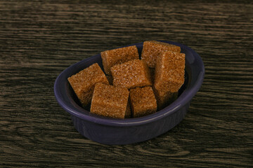 Cane sugar cubs in the bowl