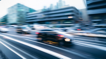 Fototapeta na wymiar motion blurred image of traffic in the cit