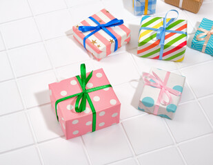 Festive atmosphere and great mood. Colorful gifts on a white background.