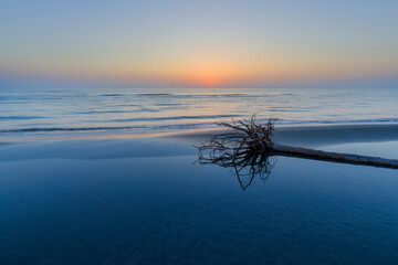 Fototapeta na wymiar Coast of the Caspian Sea at sunrise