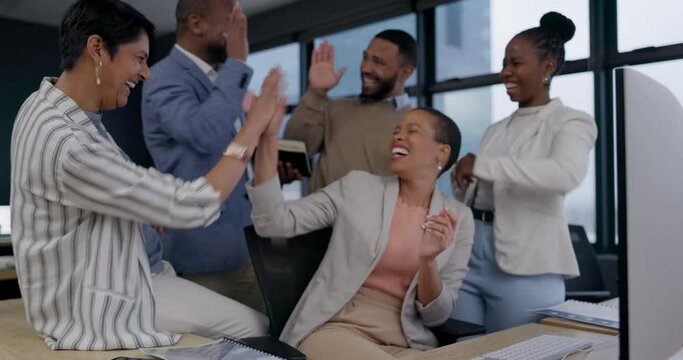 Clapping hands, success and group of business people in office by computer for teamwork success. Diversity, good news and team of professional corporate lawyers cheering by technology in workplace.