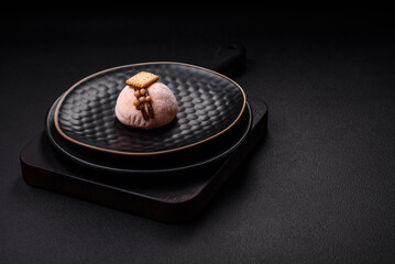 Delicious sweet colorful mochi desserts or ice cream with rice dough and toppings